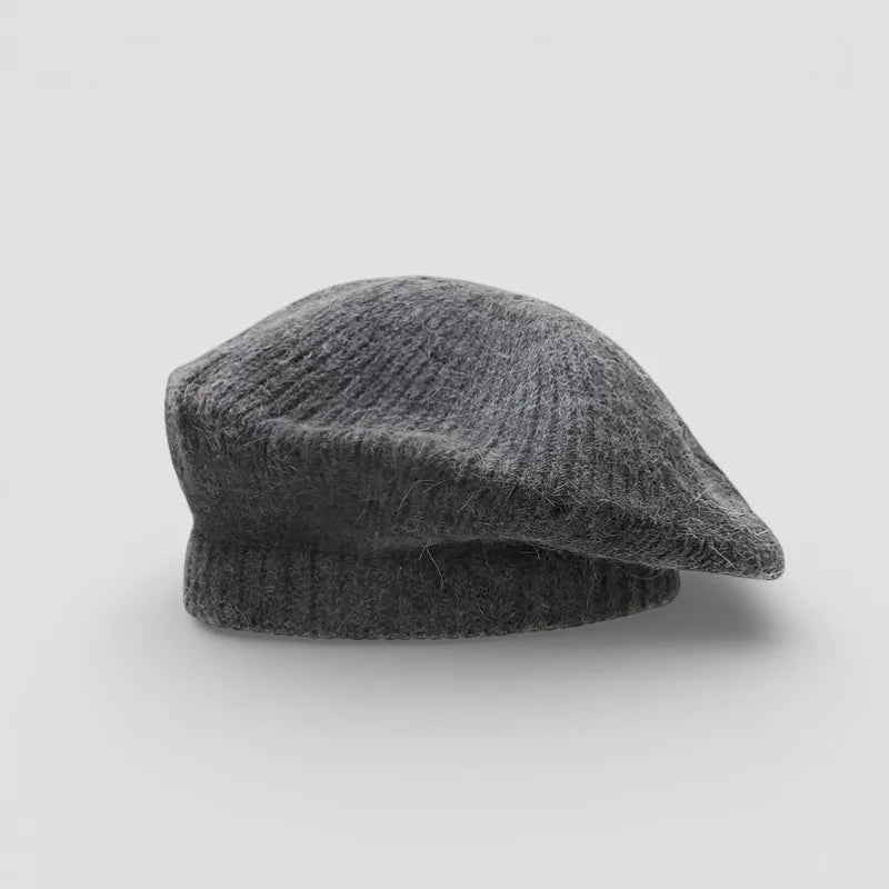 Soft dark gray wool beret with fuzzy knitted texture and rounded crown