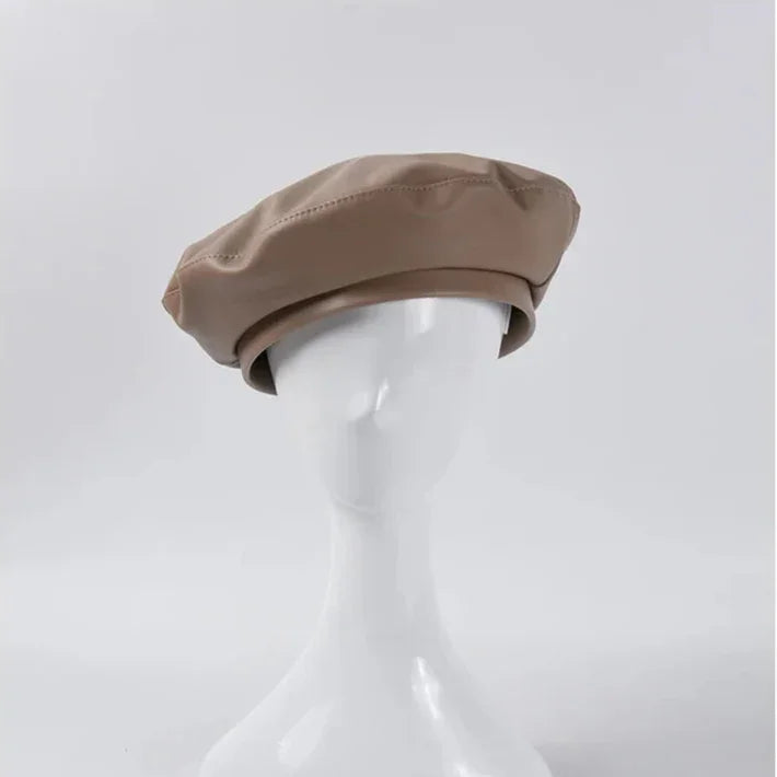Beige leather beret.