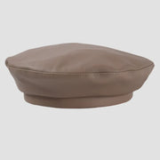 Taupe faux leather beret.