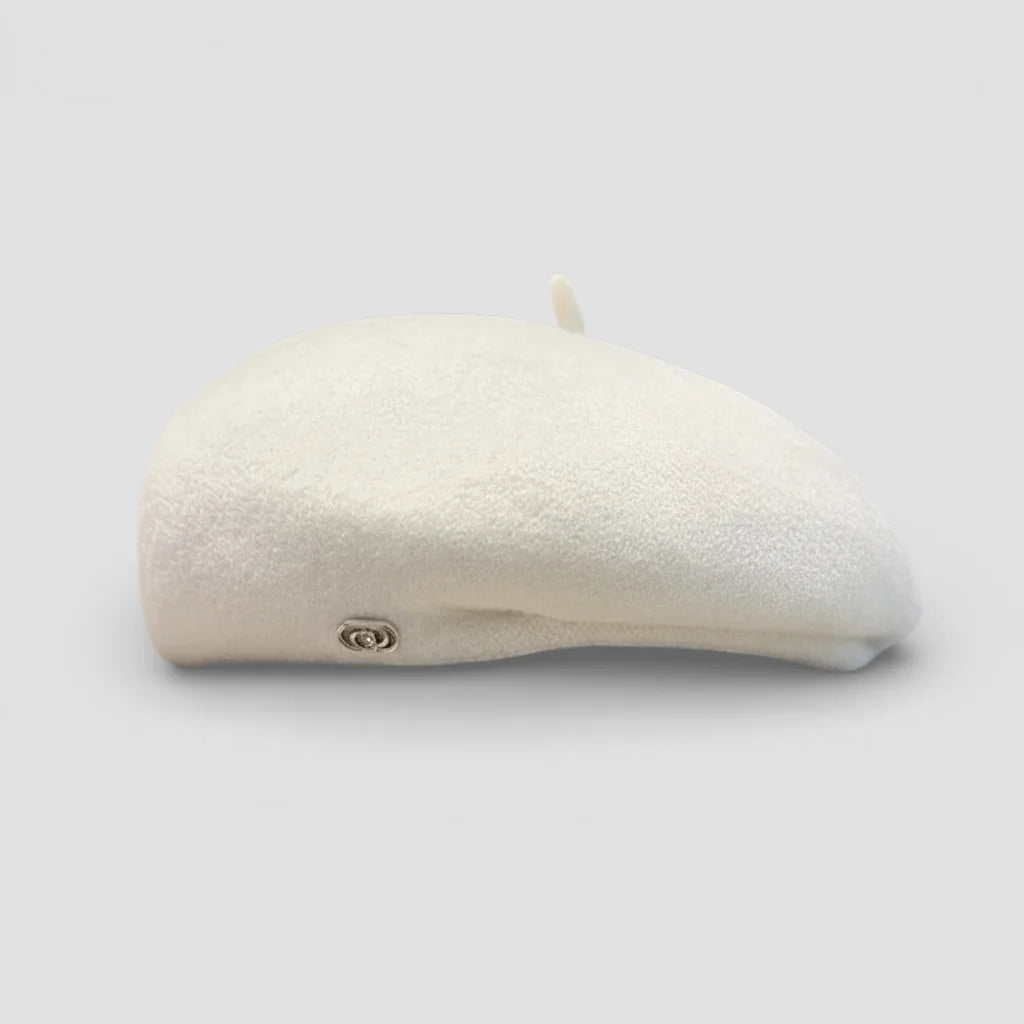 Cream-colored knit wool beret cap with metallic side emblem
