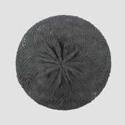 Dark gray knitted beret with intricate leaf pattern design