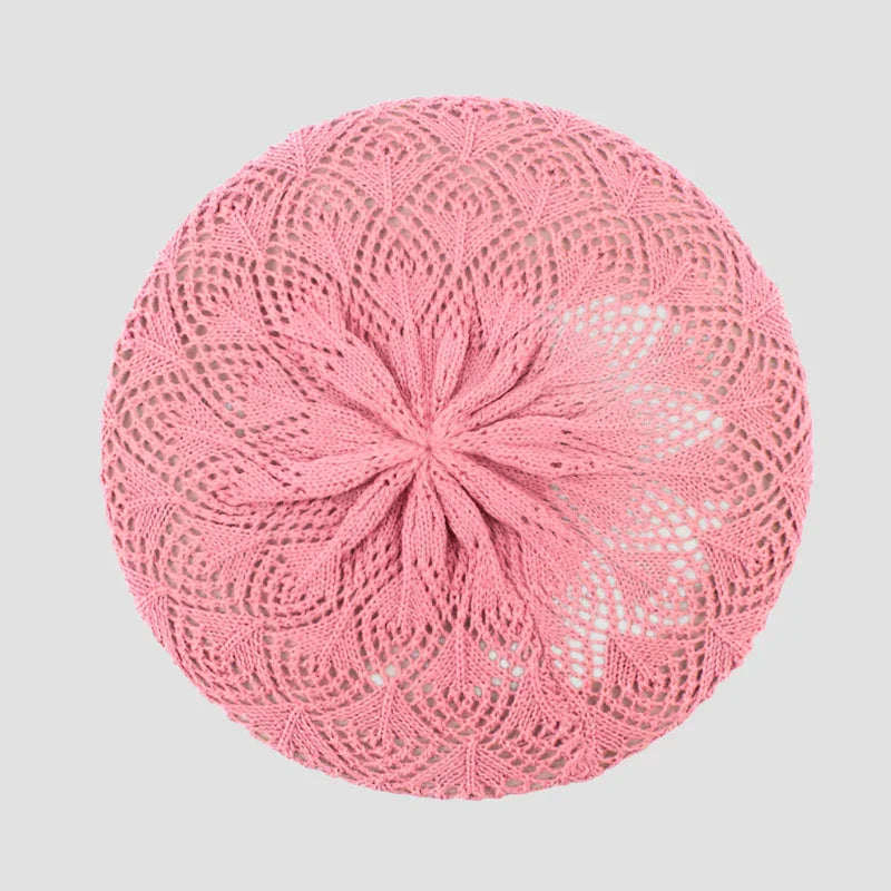 Pink knitted beret.