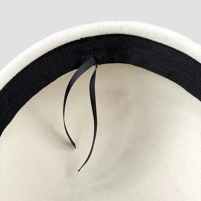 White hat with black ribbon.