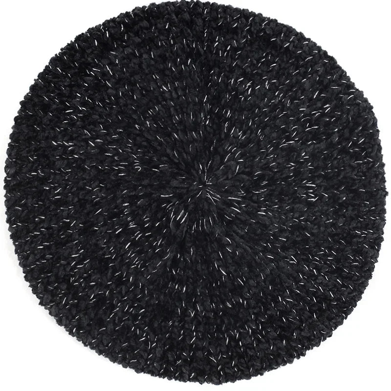 Black knitted beret with silver threads.