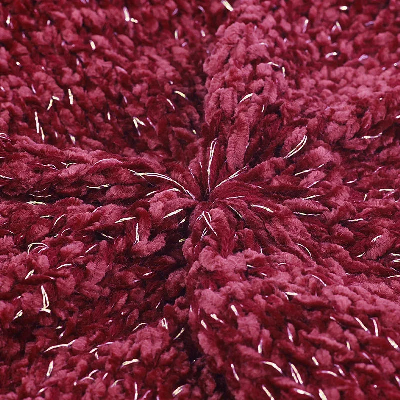 Burgundy chenille fabric with silver threads.