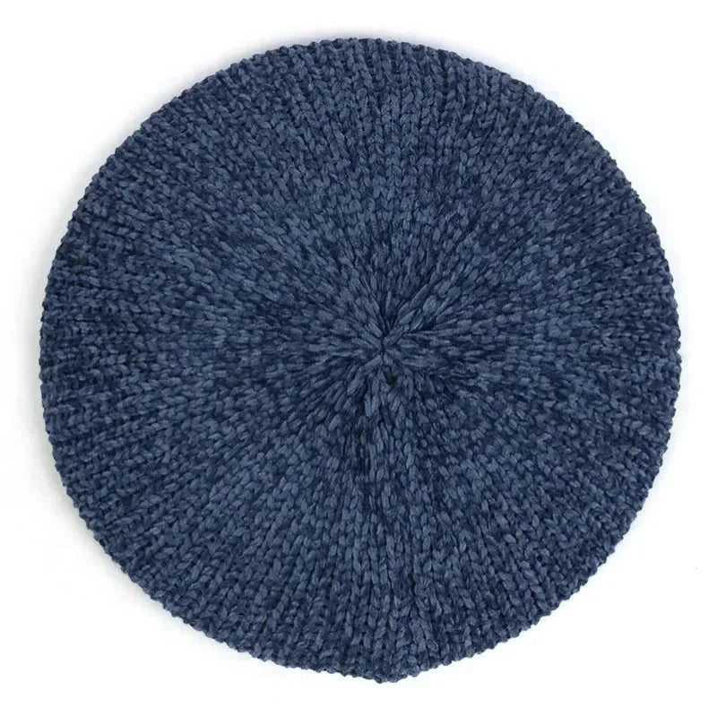 Navy blue knitted beret hat with ribbed texture and gathered center