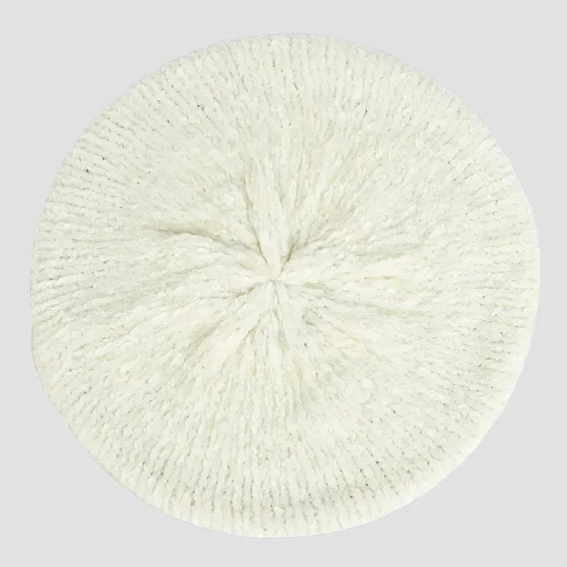 Soft off-white knitted beret hat with ribbed texture and fuzzy finish
