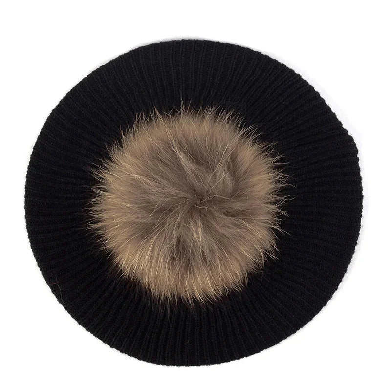 Black knit beret with fur pompom.