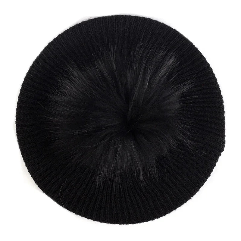 Black knit beret with fur pompom.