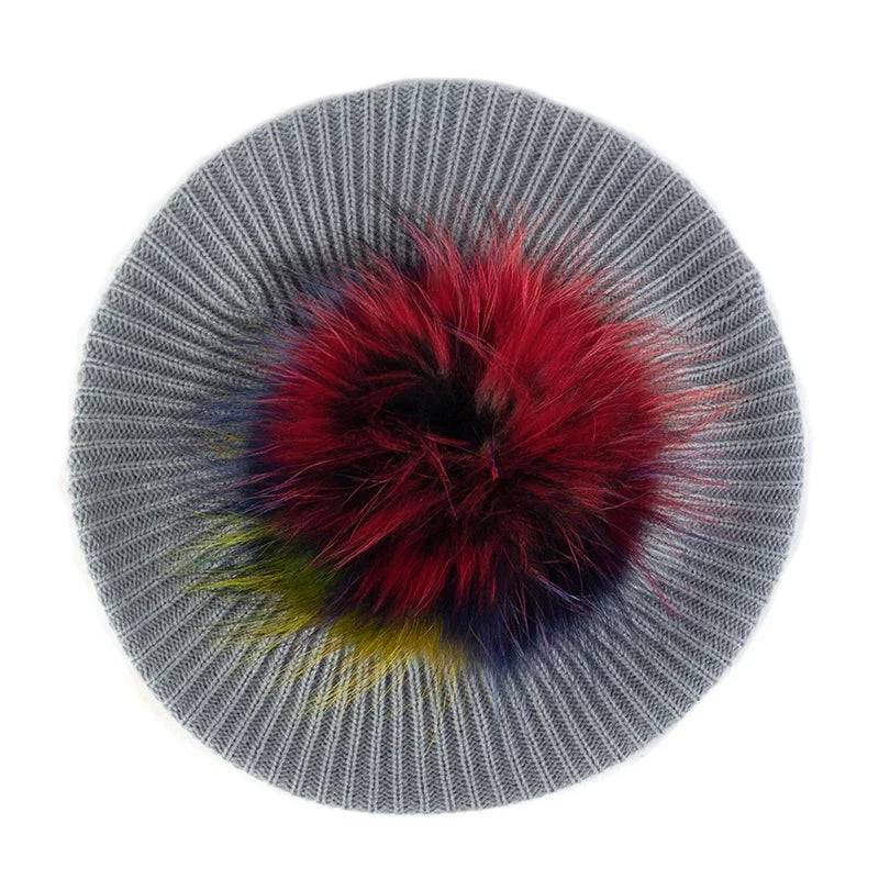 Gray knit beret with colorful pompom.