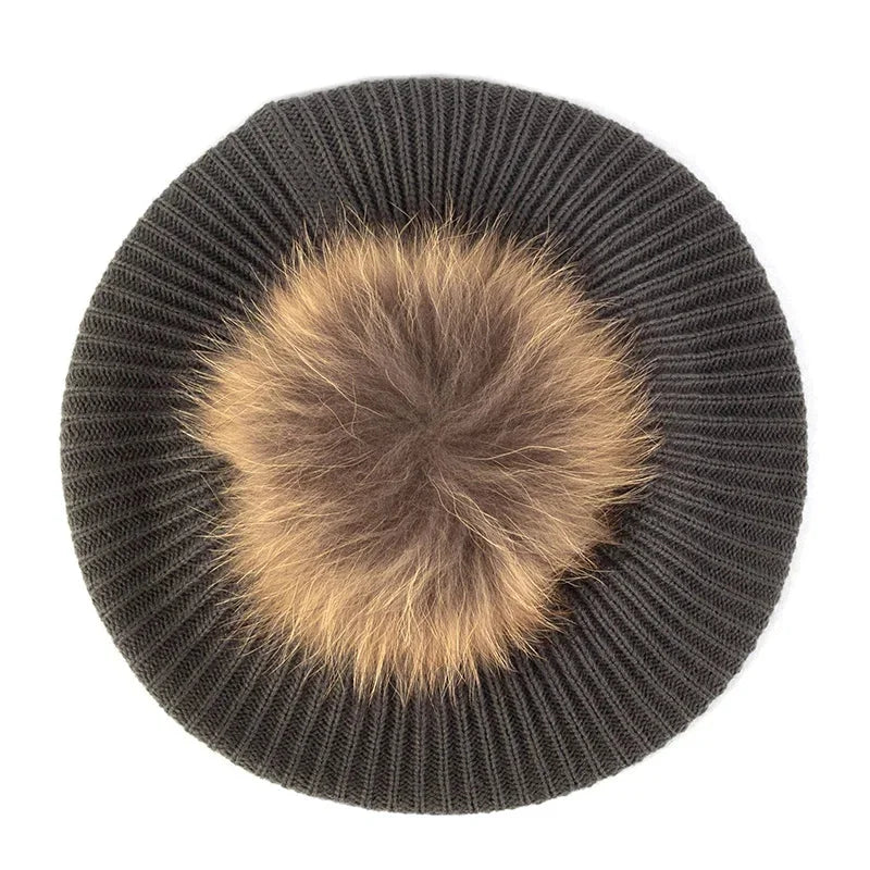 Gray knit beret with fur pompom.