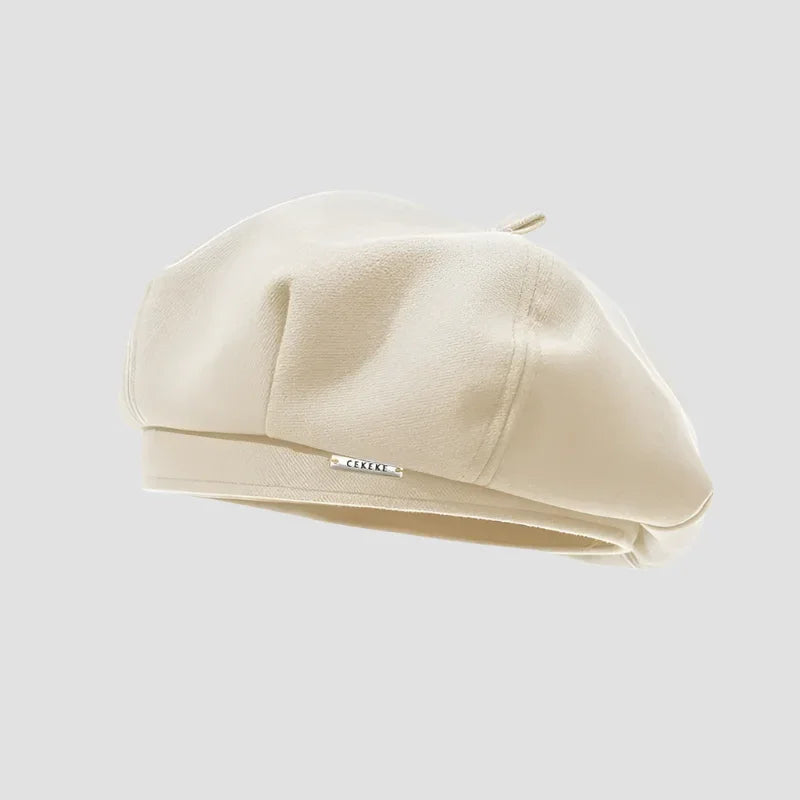 Cream-colored beret.