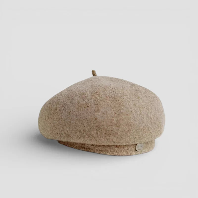 Ladies beige wool beret with side button and top tuft