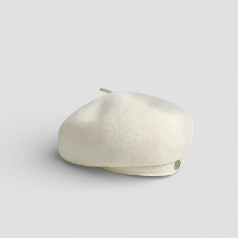 Ladies wool cream-colored felt beret with side button and top stem