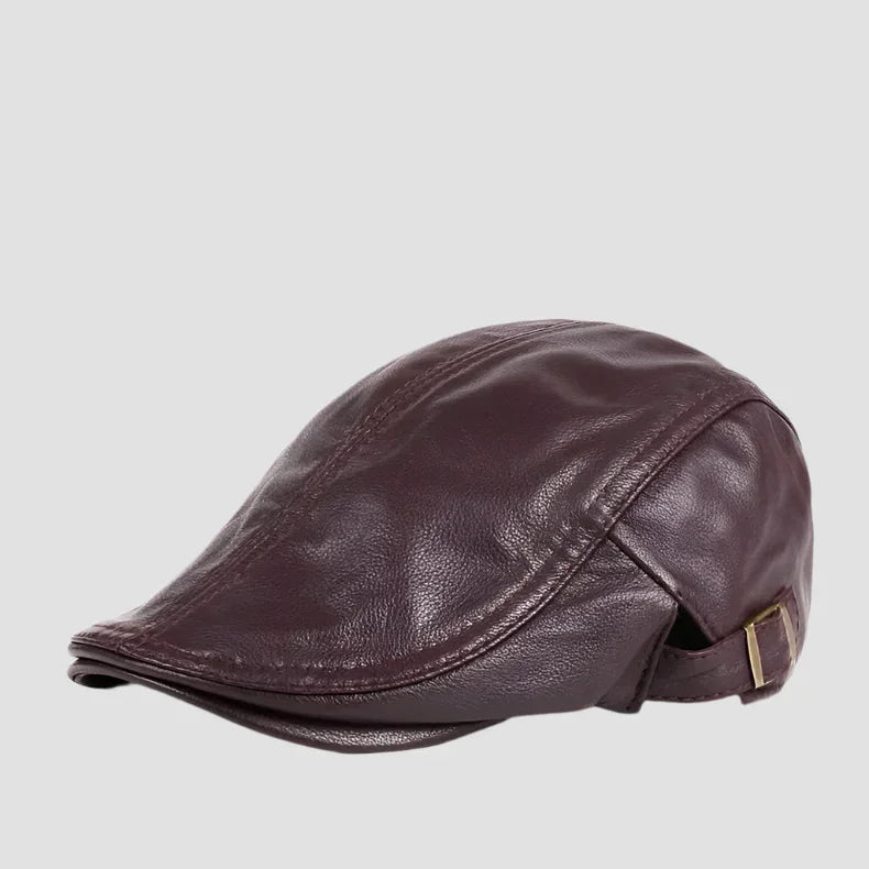 Brown leather flat cap.