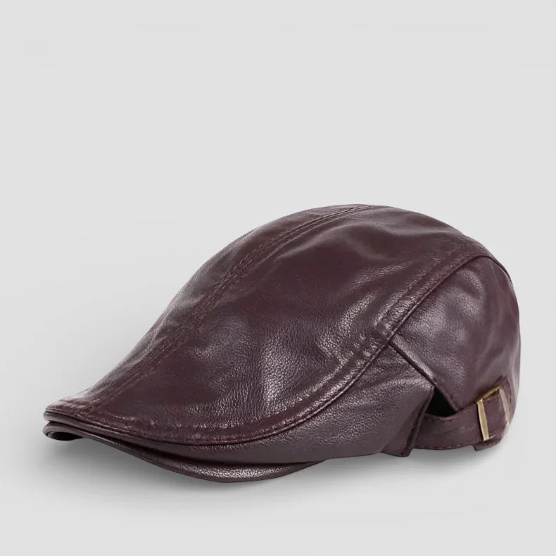 Dark brown leather flat cap with wrinkled texture and stitched seams