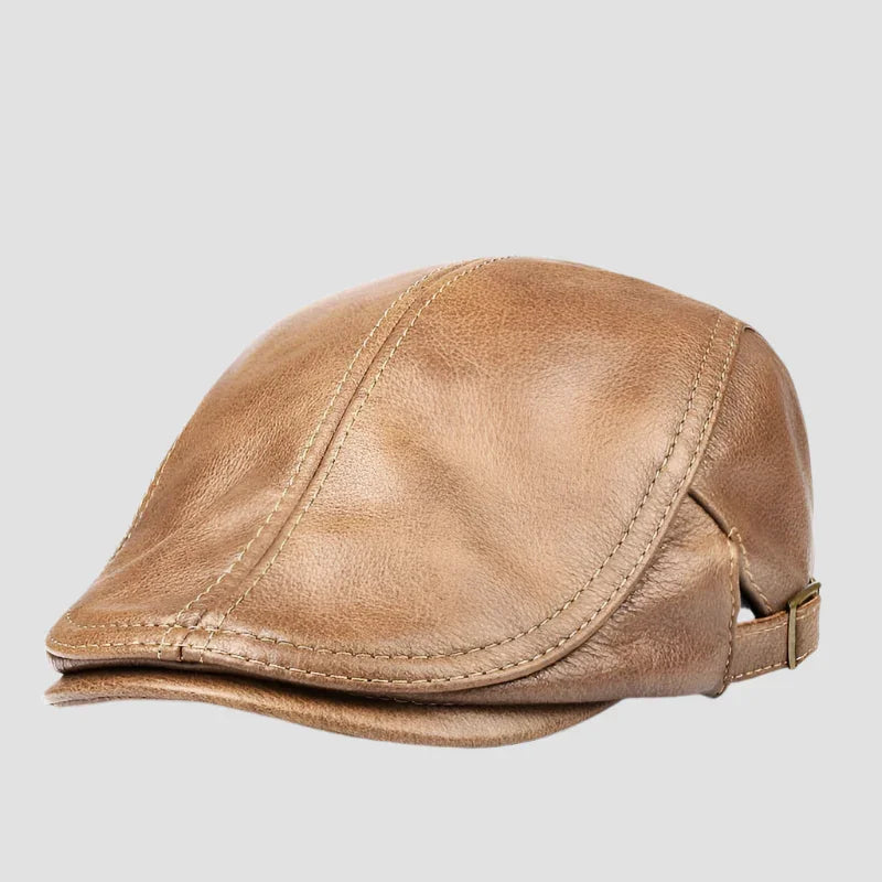 Tan leather flat cap.