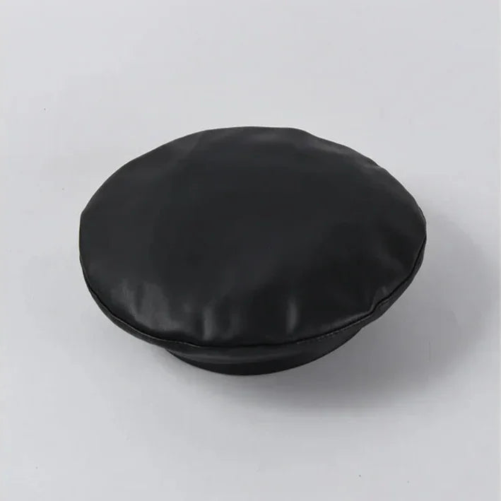 Black leather newsboy cap.