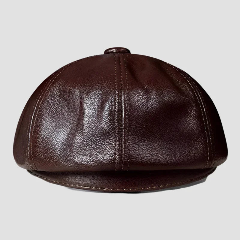 Brown leather newsboy cap.