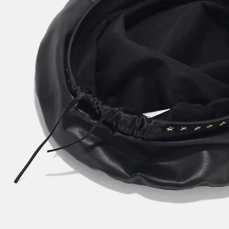 Black faux leather beret.