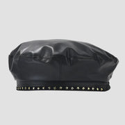 Black faux leather beret with star embellishments.