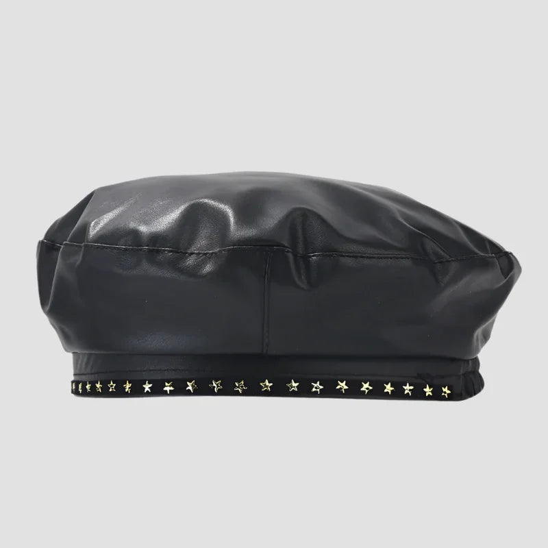 Black faux leather beret with star embellishments.