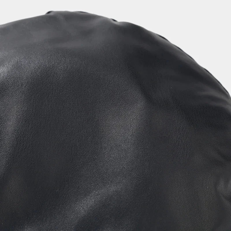 Black leather surface.