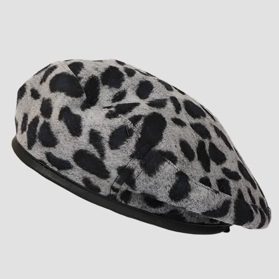 Gray and black spotted beret.