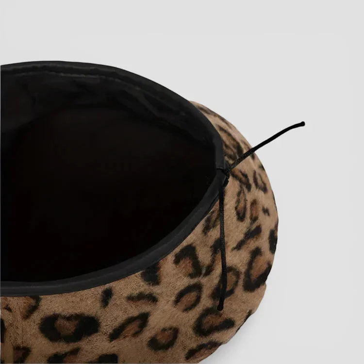 Leopard print beret hat with plush leopard-print bed and black lining