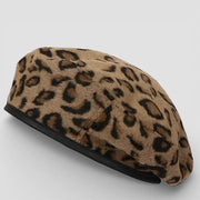 Tan and black leopard print beret hat with soft textured fabric