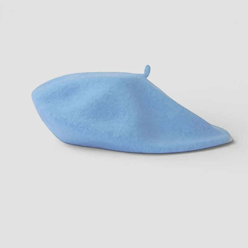 Light blue beret with soft textured fabric and top button