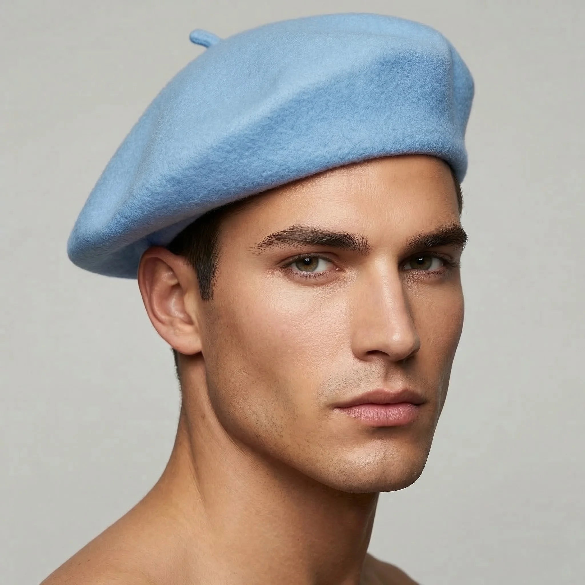 Light blue wool beret with top button, product view