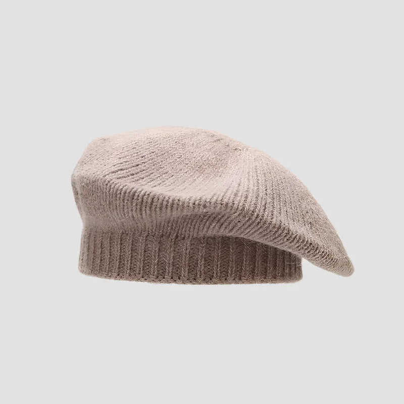 Beige knitted beret.