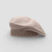 Light brown beret with soft beige knit, ribbed brim and textured crown