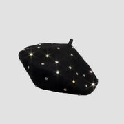 Black beret with rhinestones.