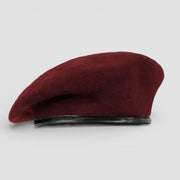 Maroon beret army hat with velvety maroon fabric and black leather band
