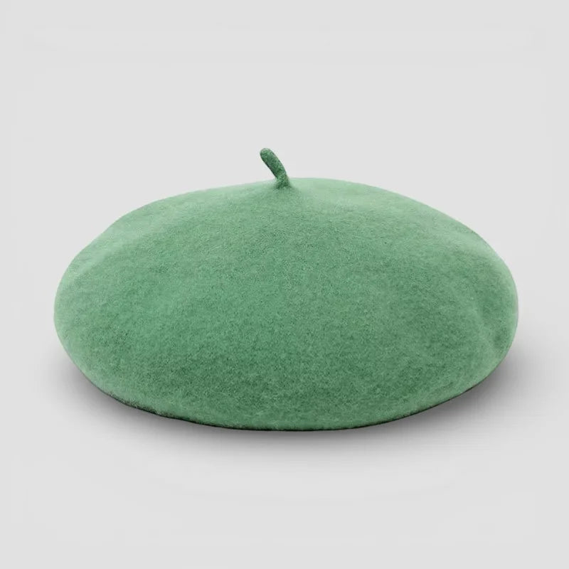 Mint green felt beret with small matching button on top