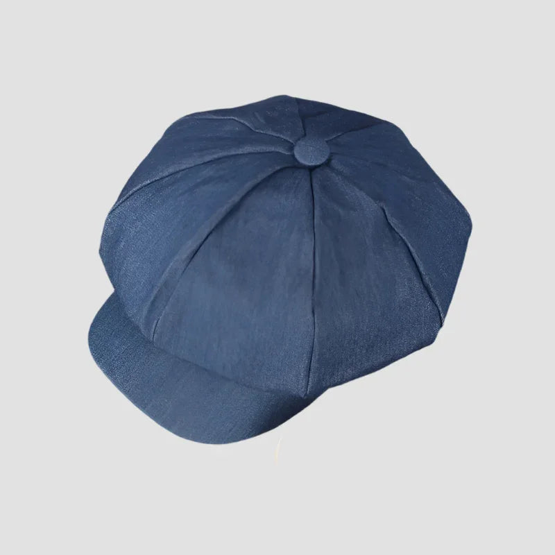 Blue newsboy cap.