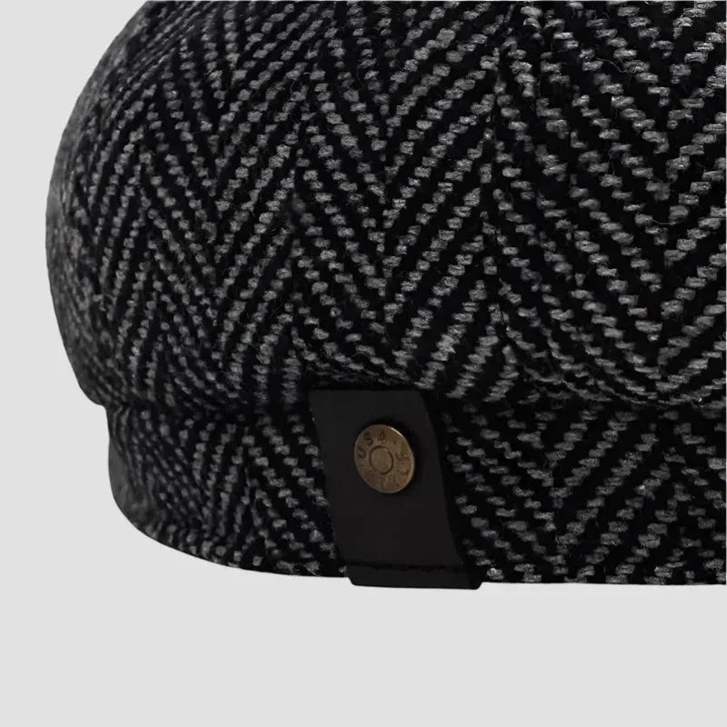 Black and gray herringbone Newsboy Cap with brass button on leather tab