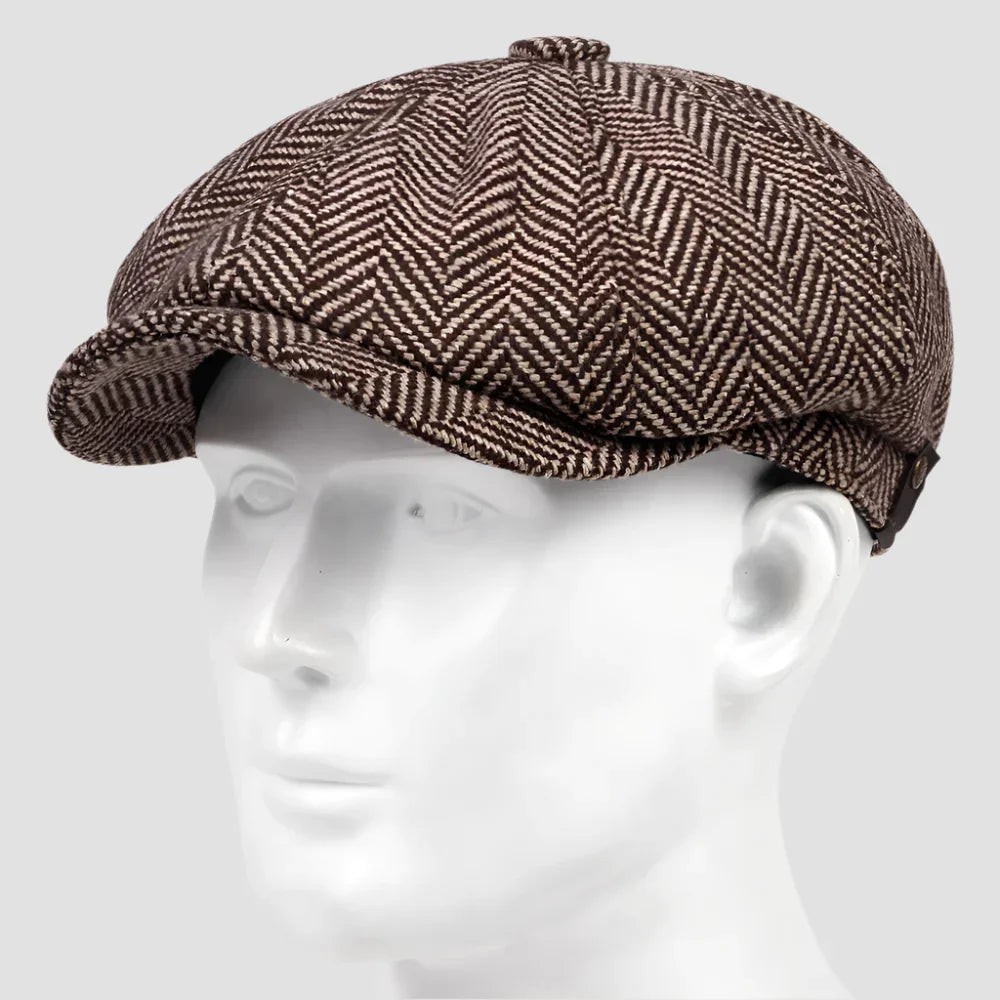 Brown herringbone newsboy cap.
