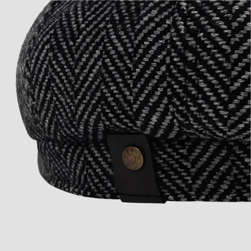 Herringbone newsboy cap.