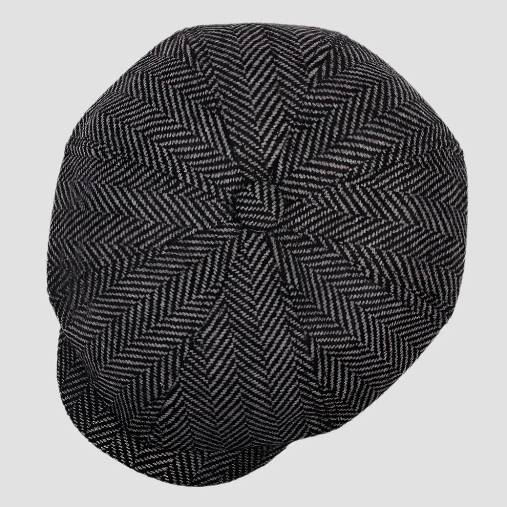 Herringbone patterned newsboy cap.