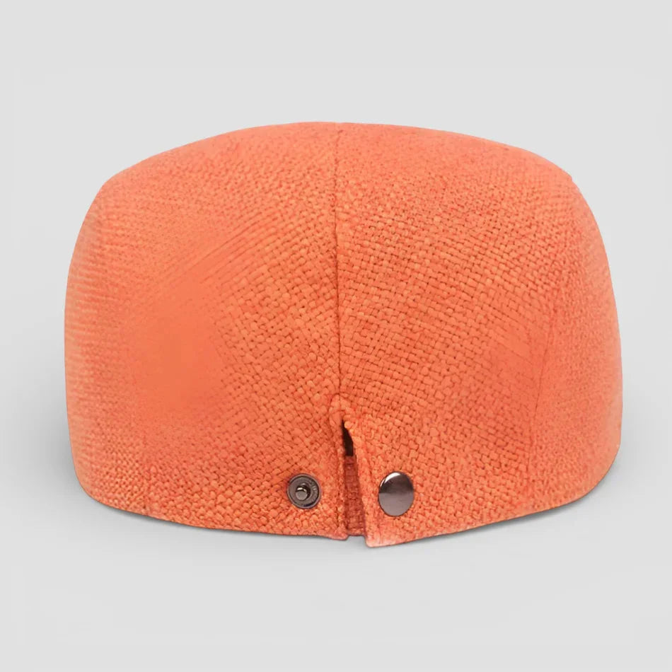 Back view of Orange Beret Cap with vibrant orange weave and metallic snap buttons