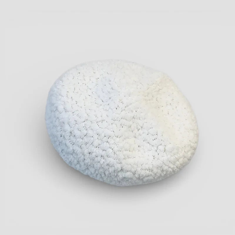 Paloma Wool Beret in smooth oval light blue to white stone texture