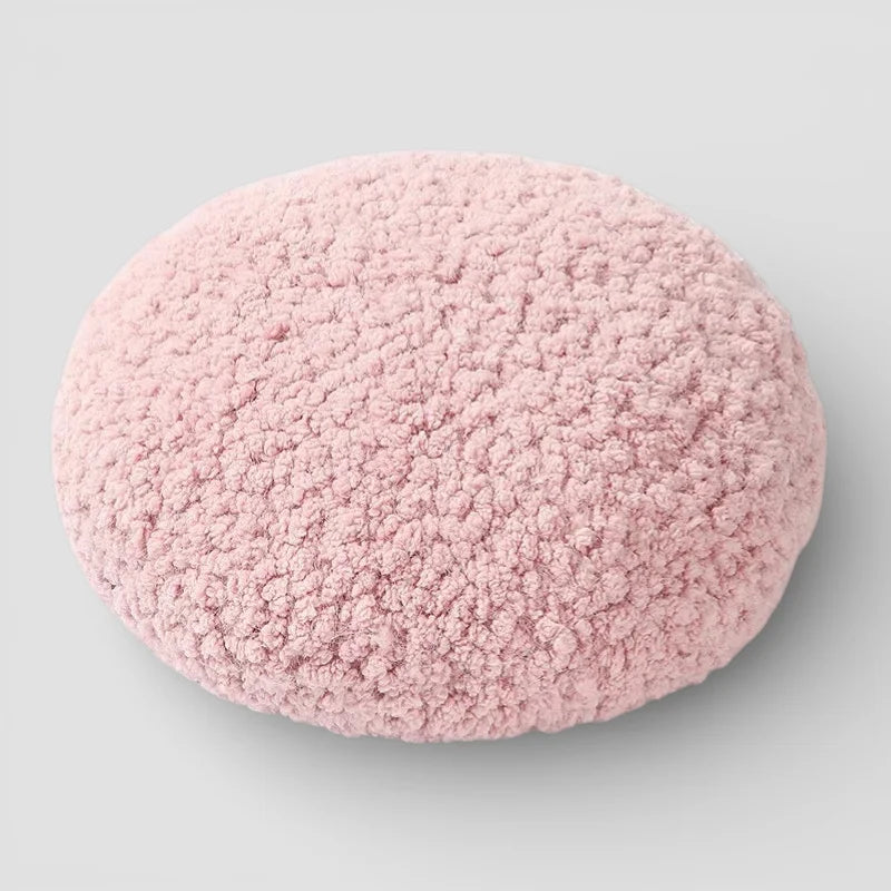 Soft pink faux fur Paloma Wool Beret cushion with plush texture