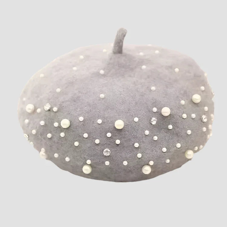 Gray beret with pearl and rhinestone embellishments.