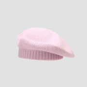 Pink knitted beret.