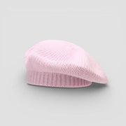 Pink wool beret with soft knitted ribbed texture and structured shape