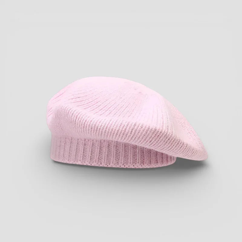 Pink wool beret with soft knitted ribbed texture and structured shape
