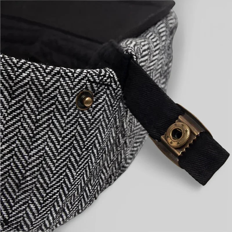 Black and white herringbone waist bag with brass clasp on Plaid Beret Cap